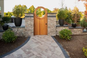 Rochester Coventry Ridge custom pillar walls and doorway with patio and retaining walls